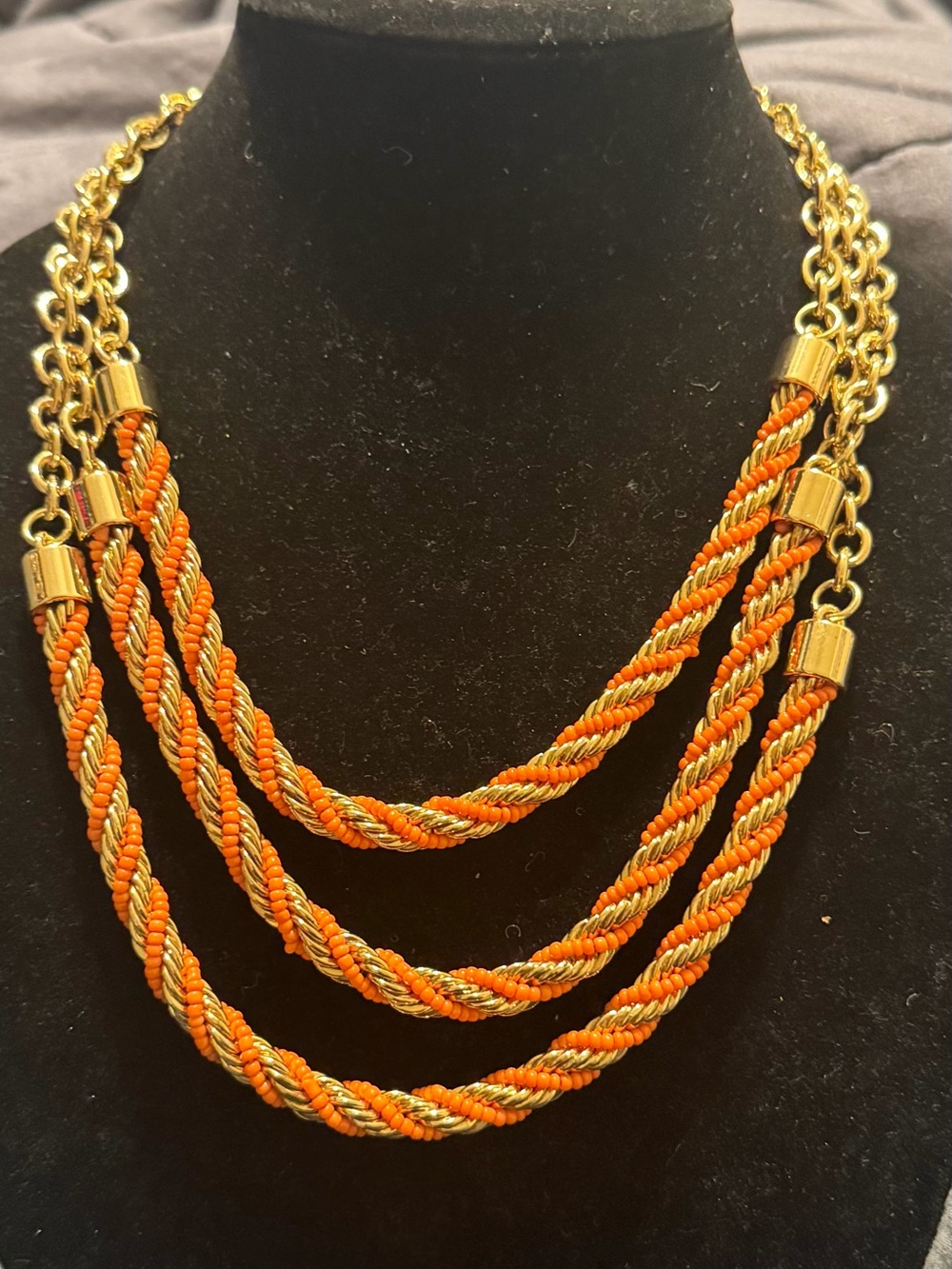 BCBGMaxAzria Gold-Tone Triple Strand Necklace with Orange Twist